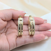 Oro Laminado Huggie Hoop, Gold Filled Style with White Cubic Zirconia, Polished, Golden Finish