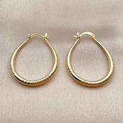 Oro Laminado Medium Hoop, Gold Filled Style Teardrop and Hollow Design, Diamond Cutting Finish, Golden Finish