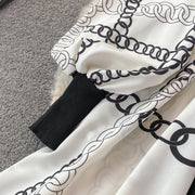 Black dress with long lantern sleeve print and high quality belt