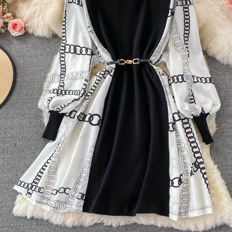 Black dress with long lantern sleeve print and high quality belt