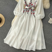 Elegant dress with flower embroidery O-neck and long puff sleeves and high quality belt