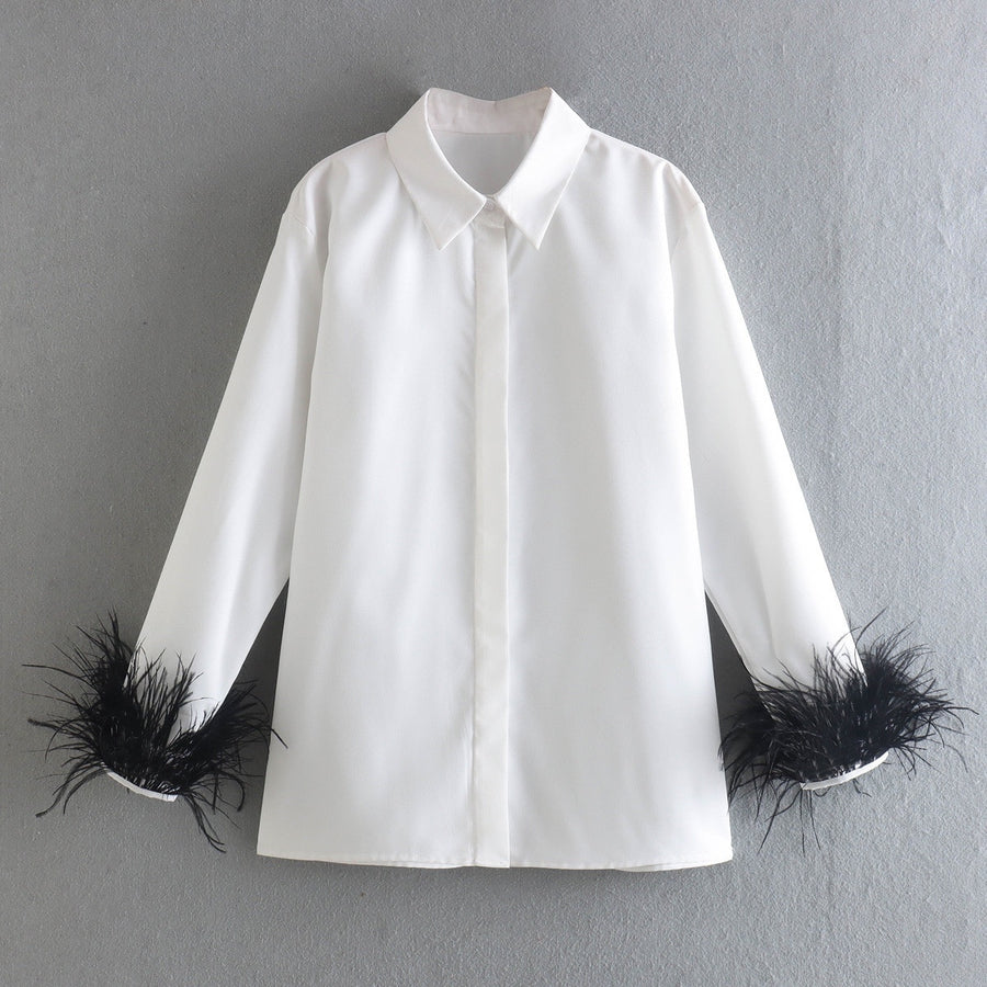 Elegant white long sleeve blouses with feathers on the cuffs