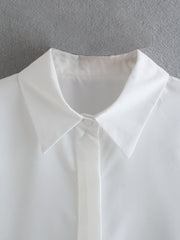 Elegant white long sleeve blouses with feathers on the cuffs
