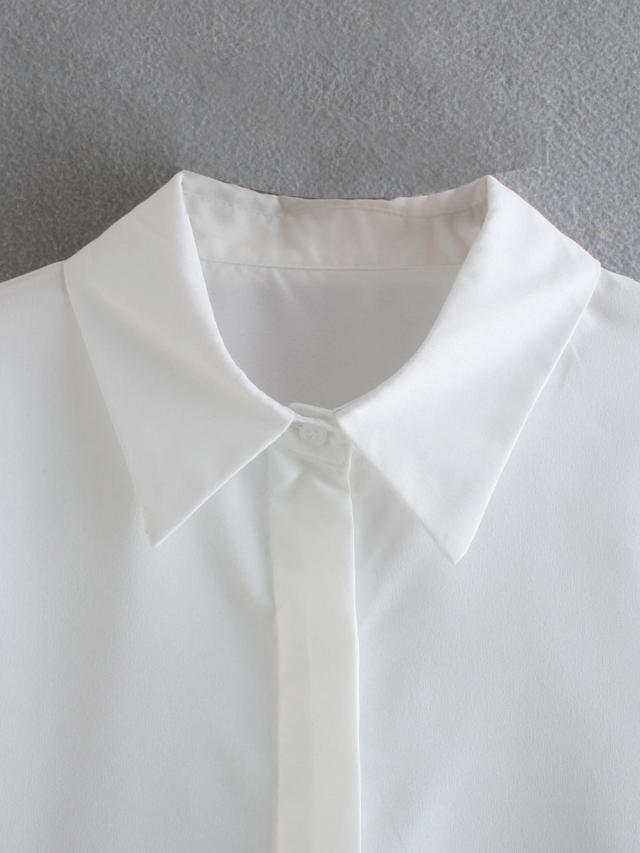Elegant white long sleeve blouses with feathers on the cuffs