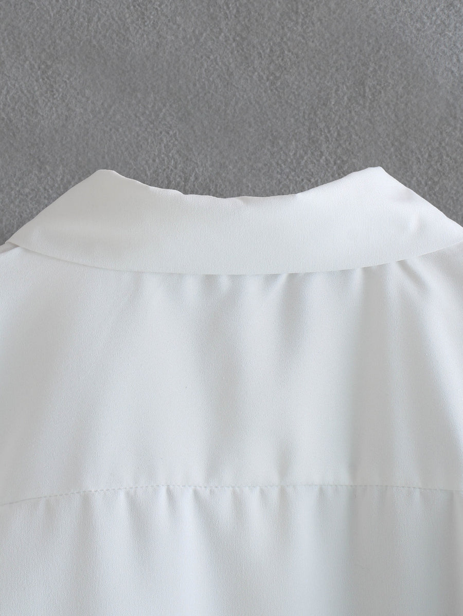 Elegant white long sleeve blouses with feathers on the cuffs