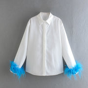 Elegant white long sleeve blouses with feathers on the cuffs