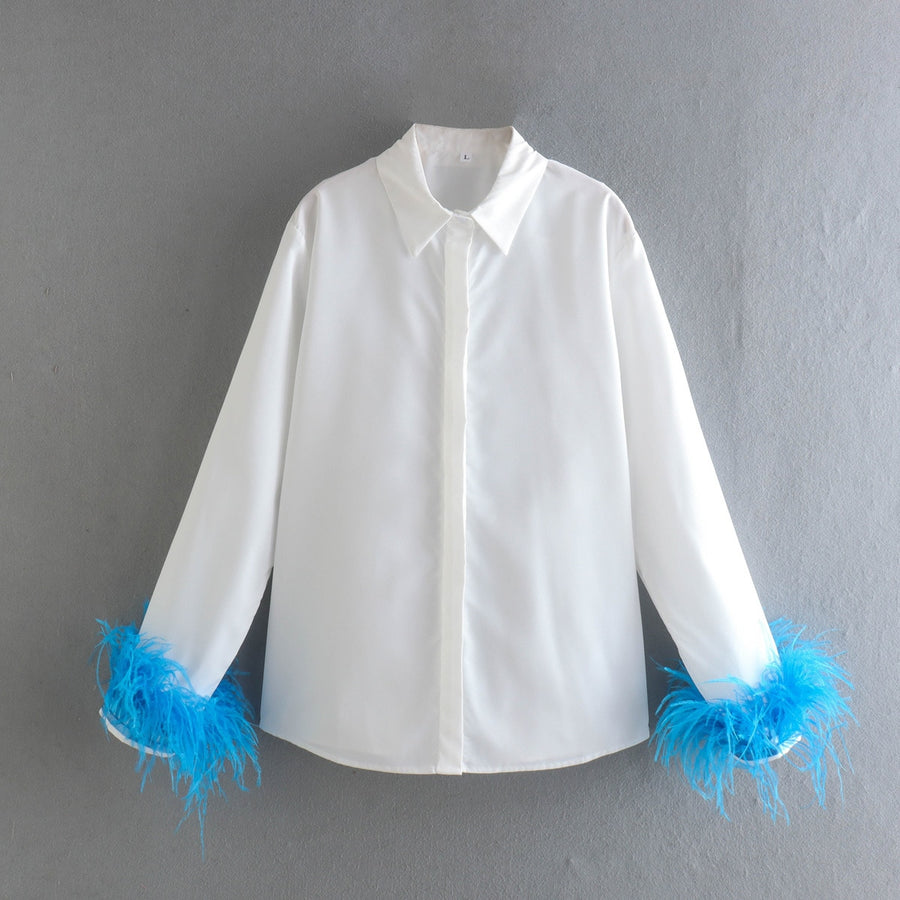 Elegant white long sleeve blouses with feathers on the cuffs
