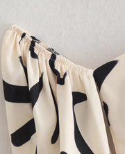 Hollow Out Waist Flare Skirt Graffiti Print Strapless Tops Set