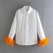 Elegant white long sleeve blouses with feathers on the cuffs