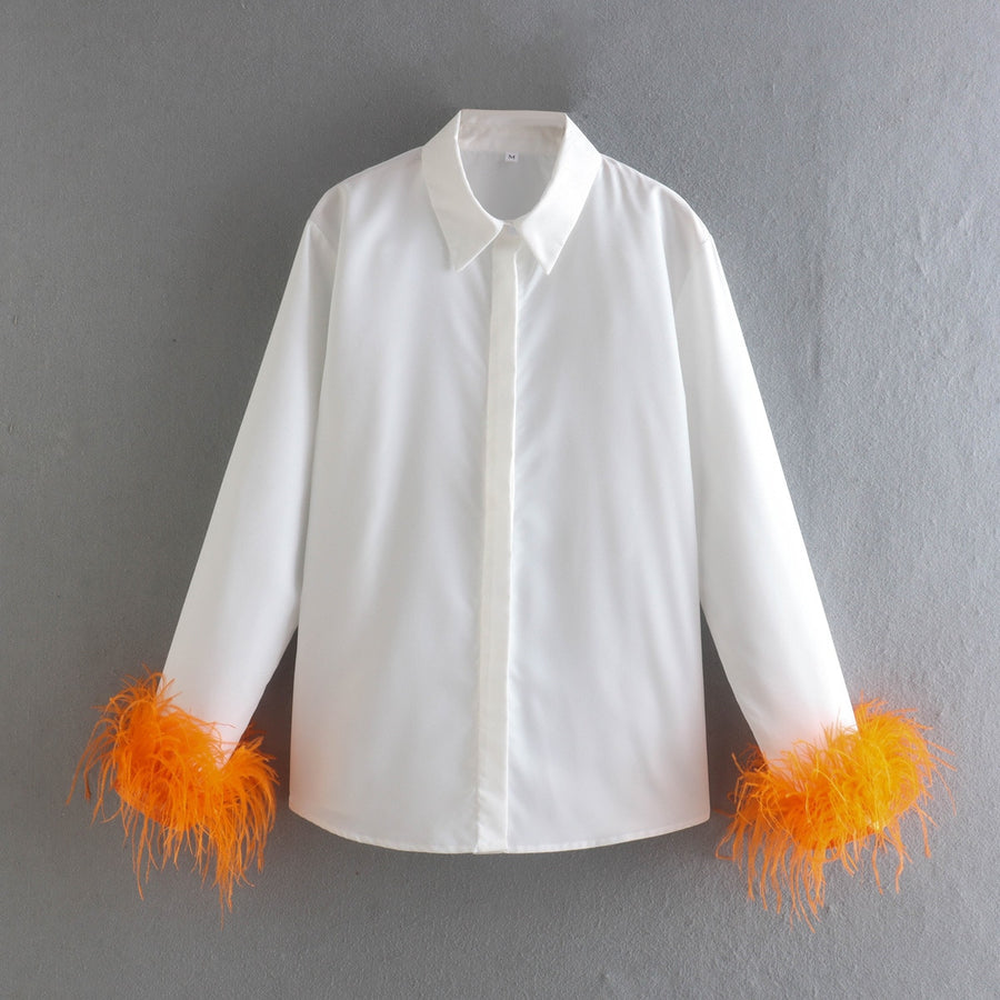 Elegant white long sleeve blouses with feathers on the cuffs